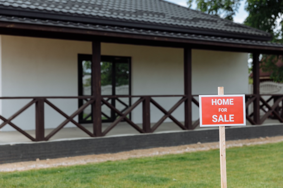 Yard sign in front of a house